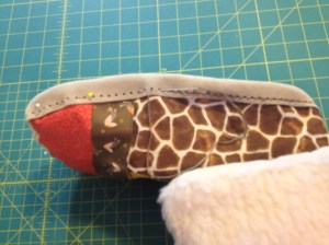 Soles sewn on with a back stitch