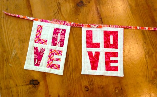 We each made a paper pieced LOVE flag.