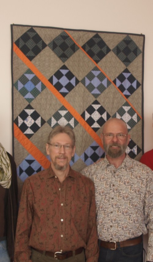 Frederick Nunley (on the right) with his partner Keith and Shoofly Orange Slice. Photo courtesy Anacostia Arts Center